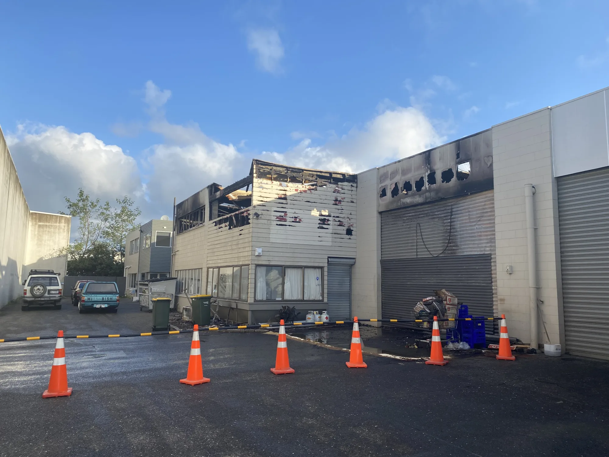 78B Parana Road — upper storey and cladding destroyed by an electrical fire, site cordoned off
